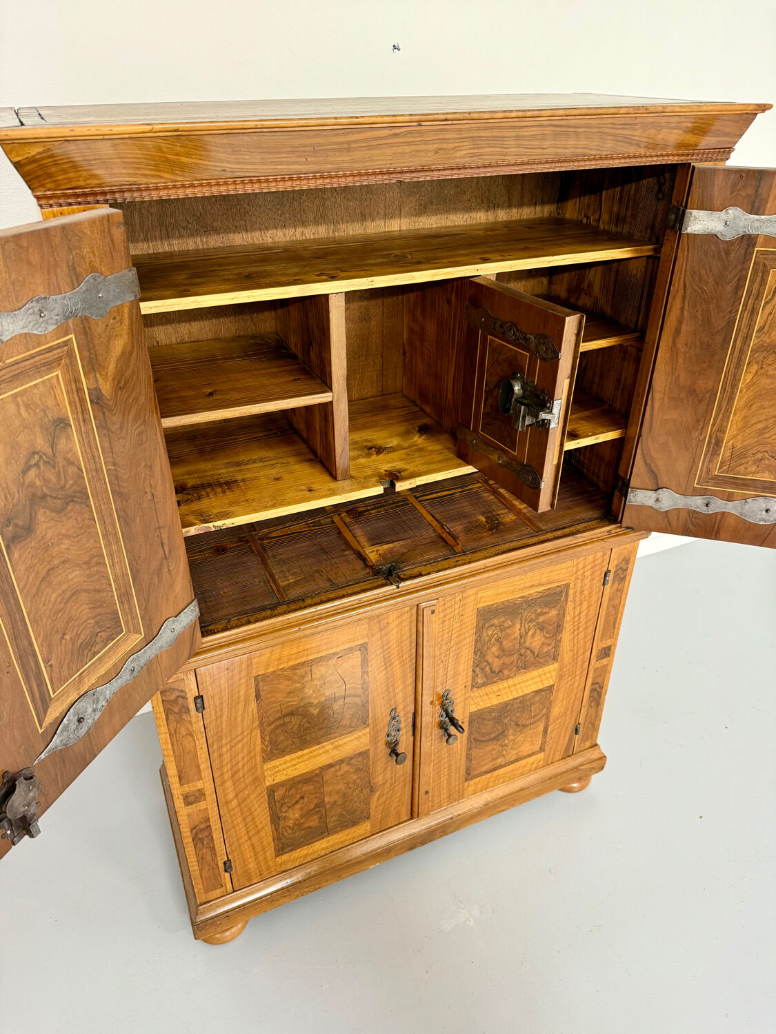 Antique 19th century Biedermeier art deco chest of drawers in walnut with wrought iron locks