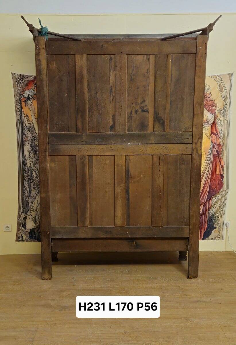 Norman Wedding Armoire in solid oak, richly carved, Louis period.