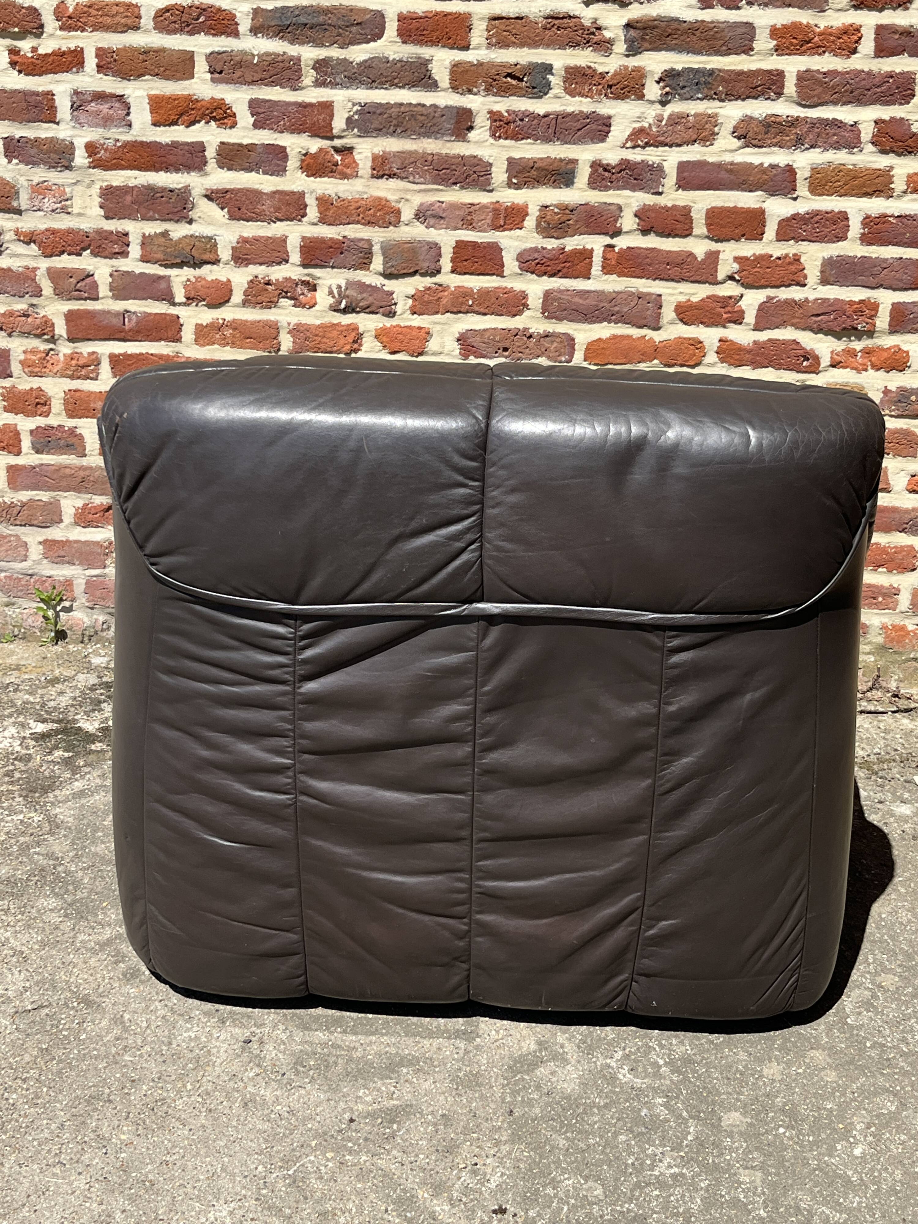 Pair of patinated leather club armchairs