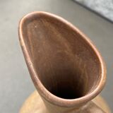 Pitcher with sandstone cap