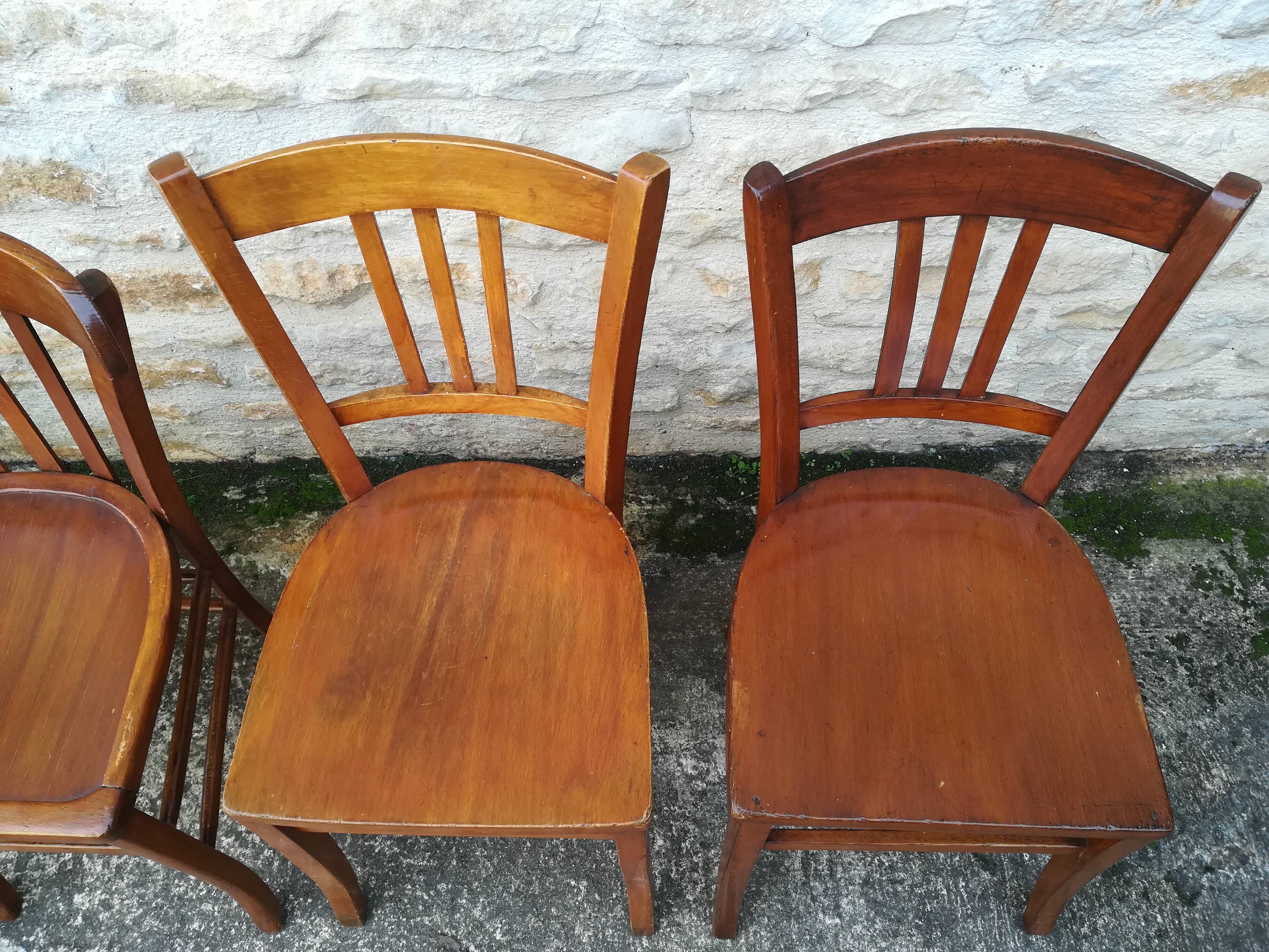 Set of 8 mismatched bistro chairs