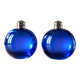 Bright blue glass salt and pepper shakers in a spherical shape.