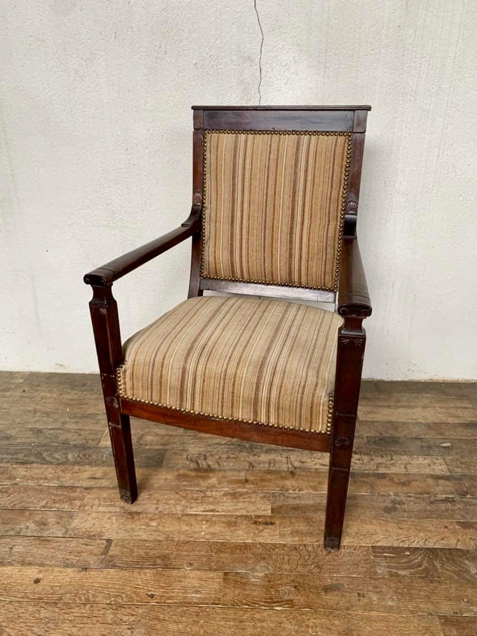 Fauteuil de bureau empire en acajou decor palmettes xviiième