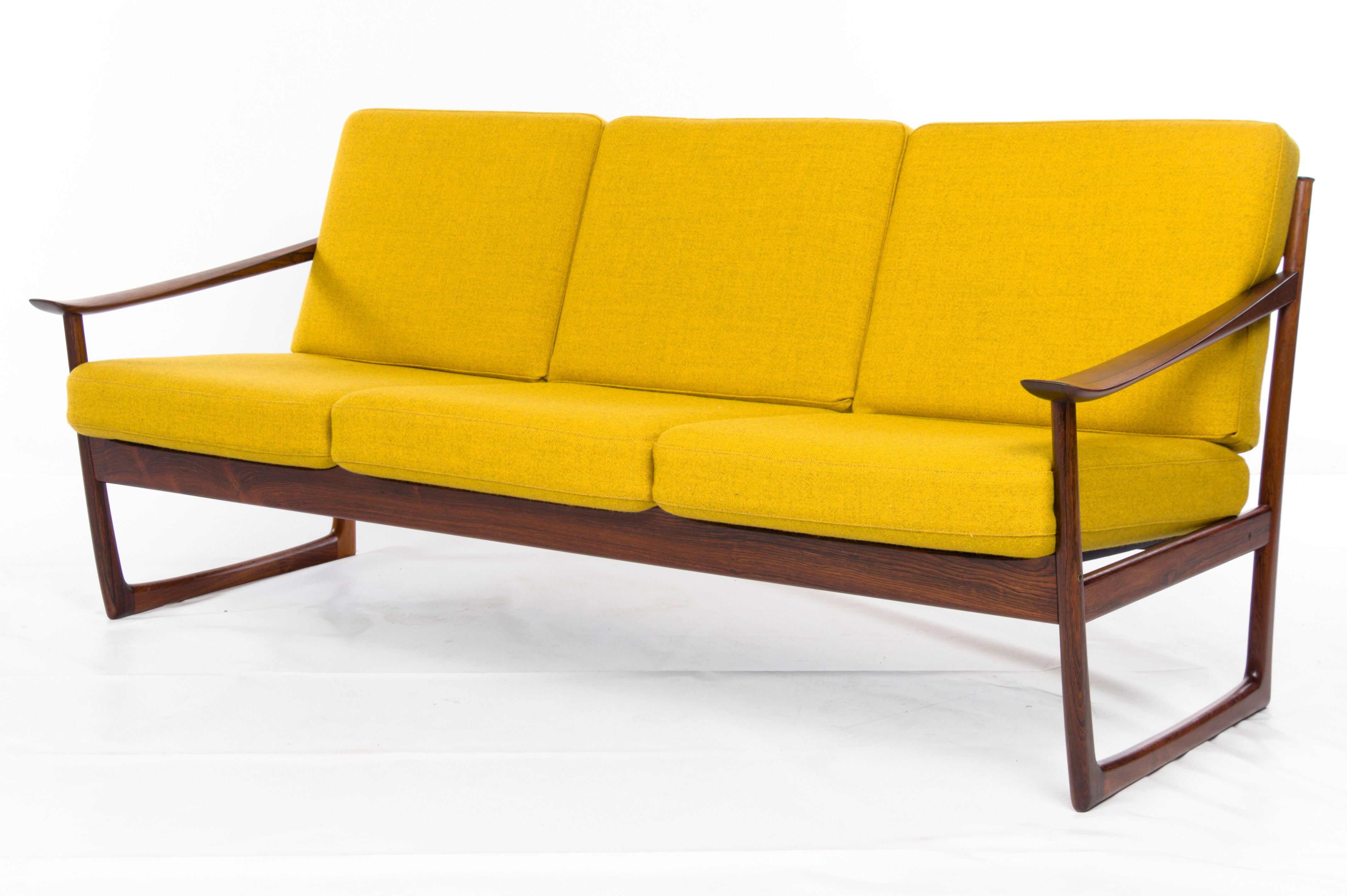Sofa, armchairs, and table by Peter Hvidt for France & Son