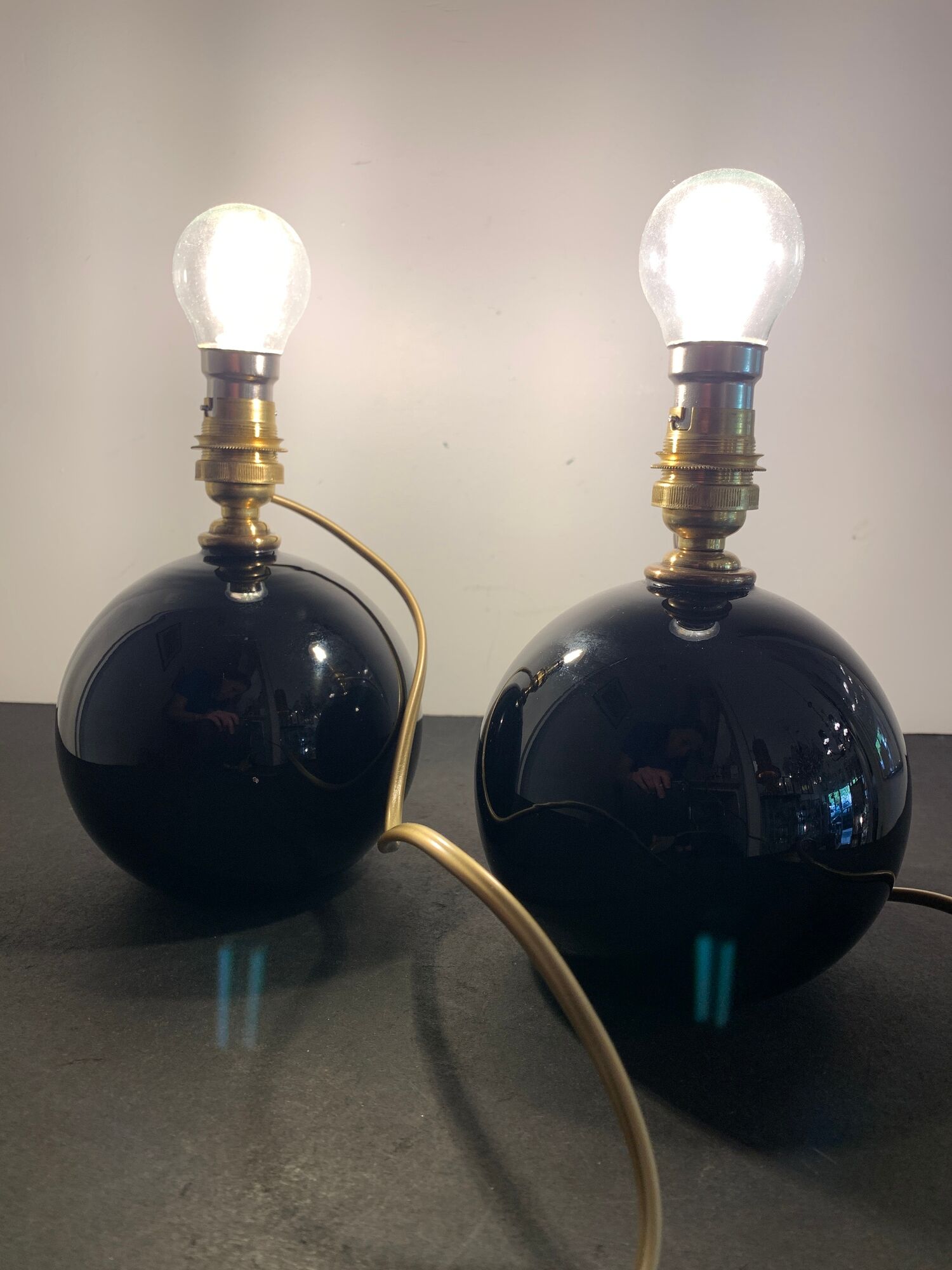 Pair of feet of black opaline art deco lamps