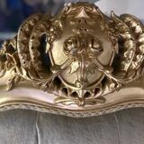 A soft light blue and silver tufted beech wood sofa in Louis style.