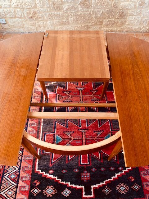 Expandable teak dining table, butterfly extension, circa 60s