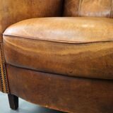 Charming and rugged sheepskin leather armchair, large model