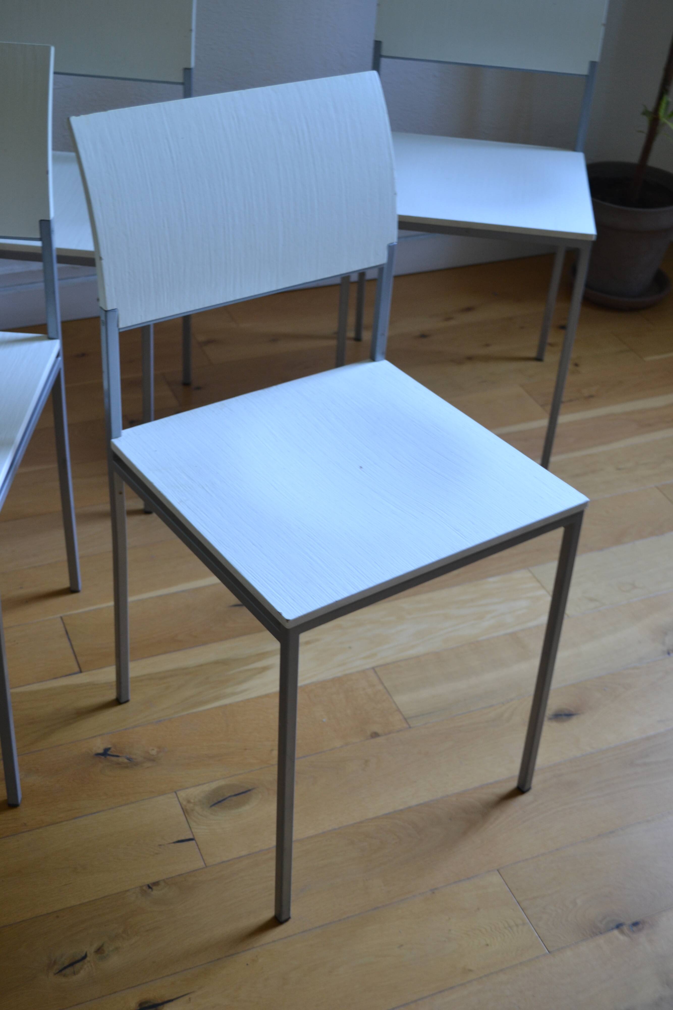 Set of 4 vintage metal and wood chairs from the 1990s.
