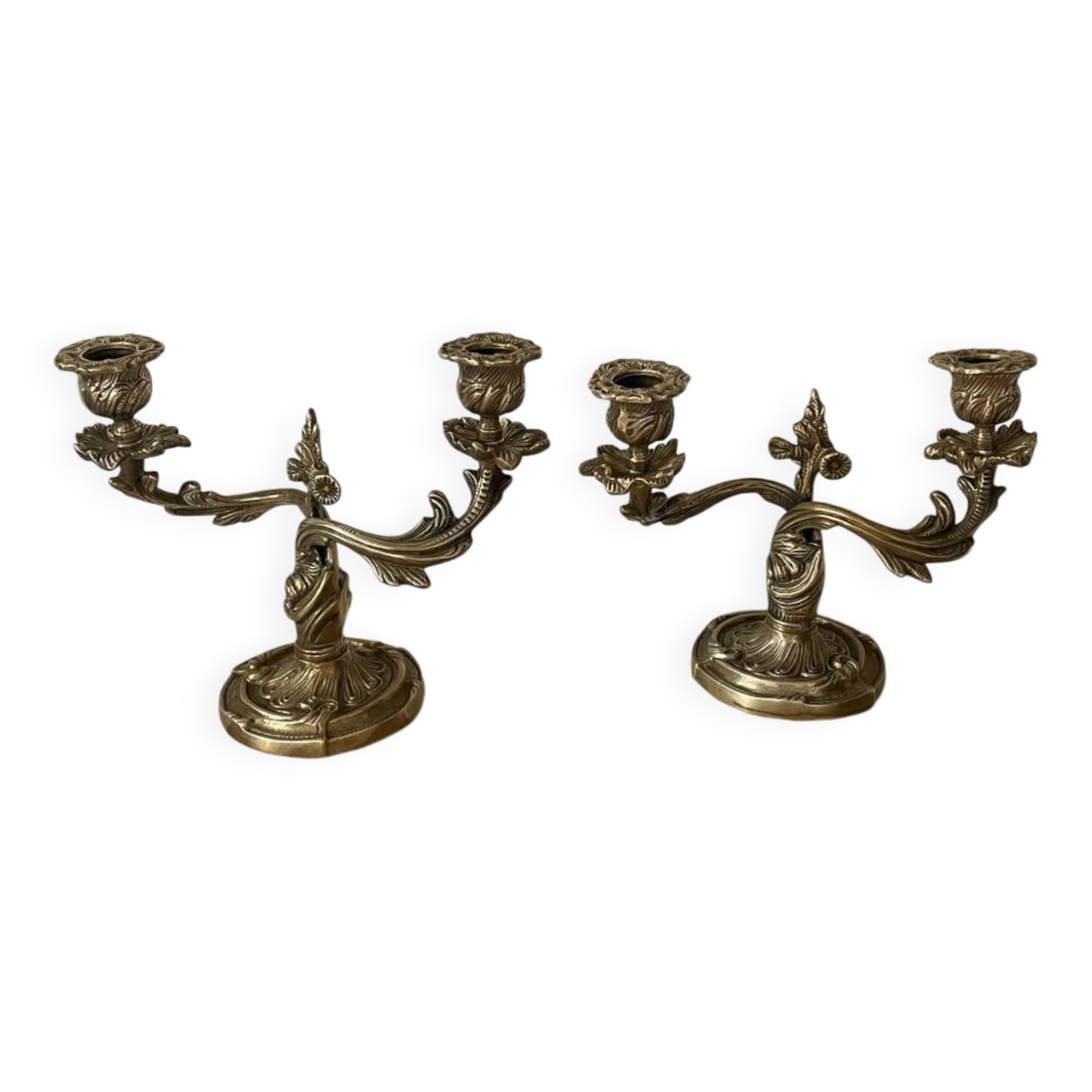 Pair of rocaille candlesticks in gilded bronze