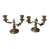Pair of rocaille candlesticks in gilded bronze