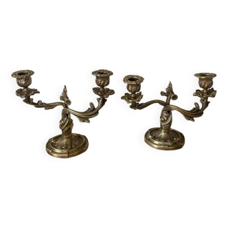 Pair of rocaille candlesticks in gilded bronze