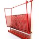 Vintage magazine rack in red lacquered perforated metal from the 70s