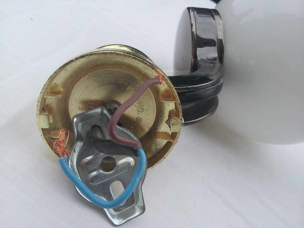 Pair of chromed and opaline metal wall lights