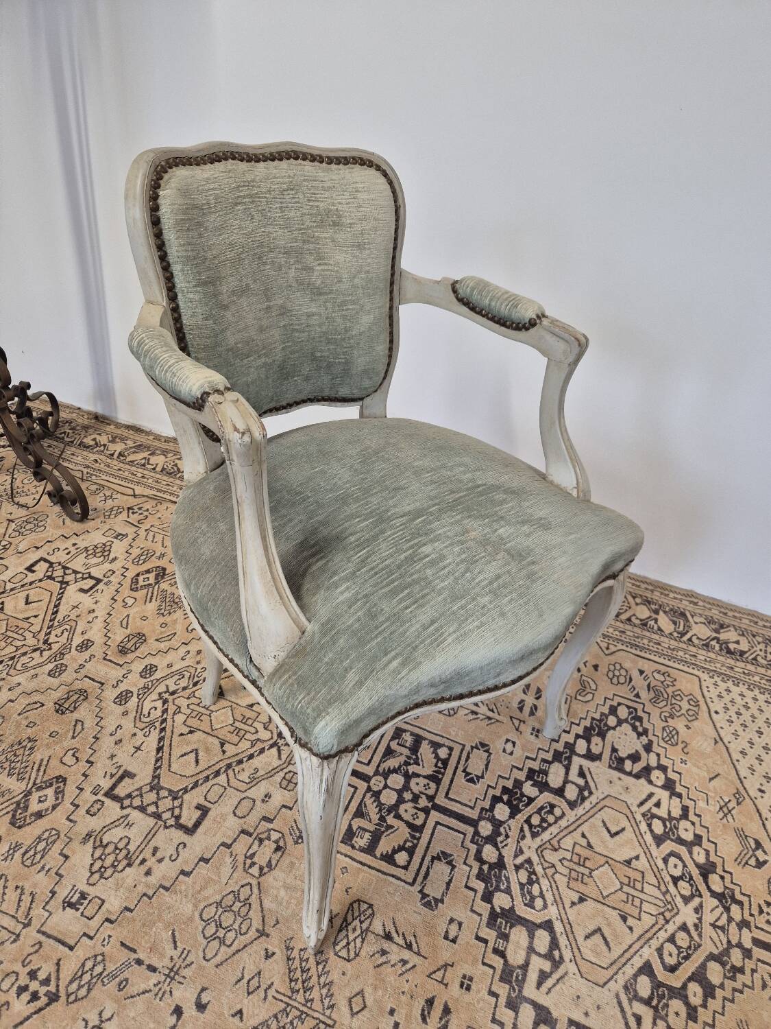 Louis XV style cabriolet armchair in patinated wood and velvet