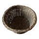Round wicker basket with a patina