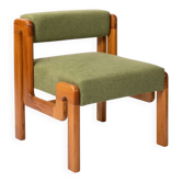 Wooden armchair with pea green upholstery