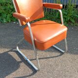Vintage leatherette and chrome armchair