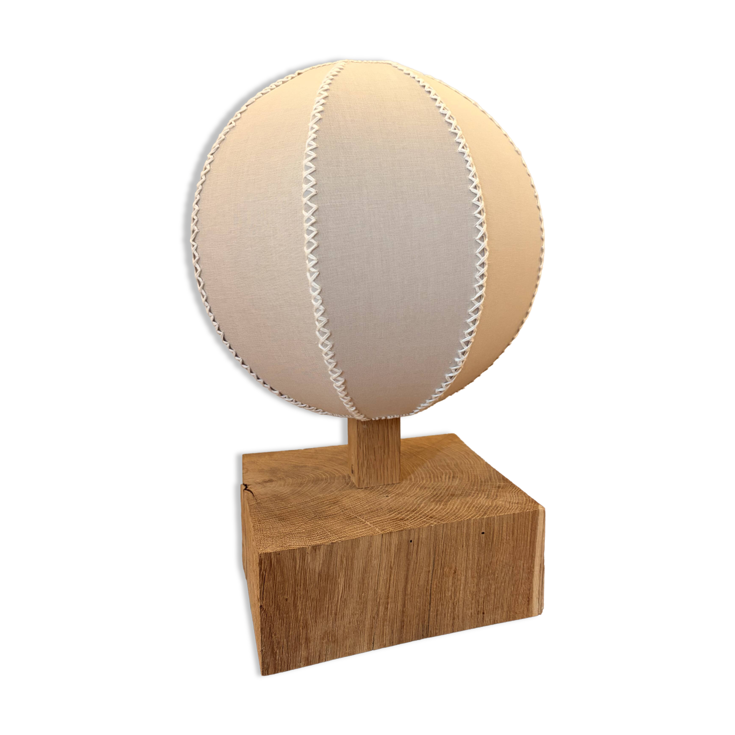 Handmade wooden ball lamp on a stand
