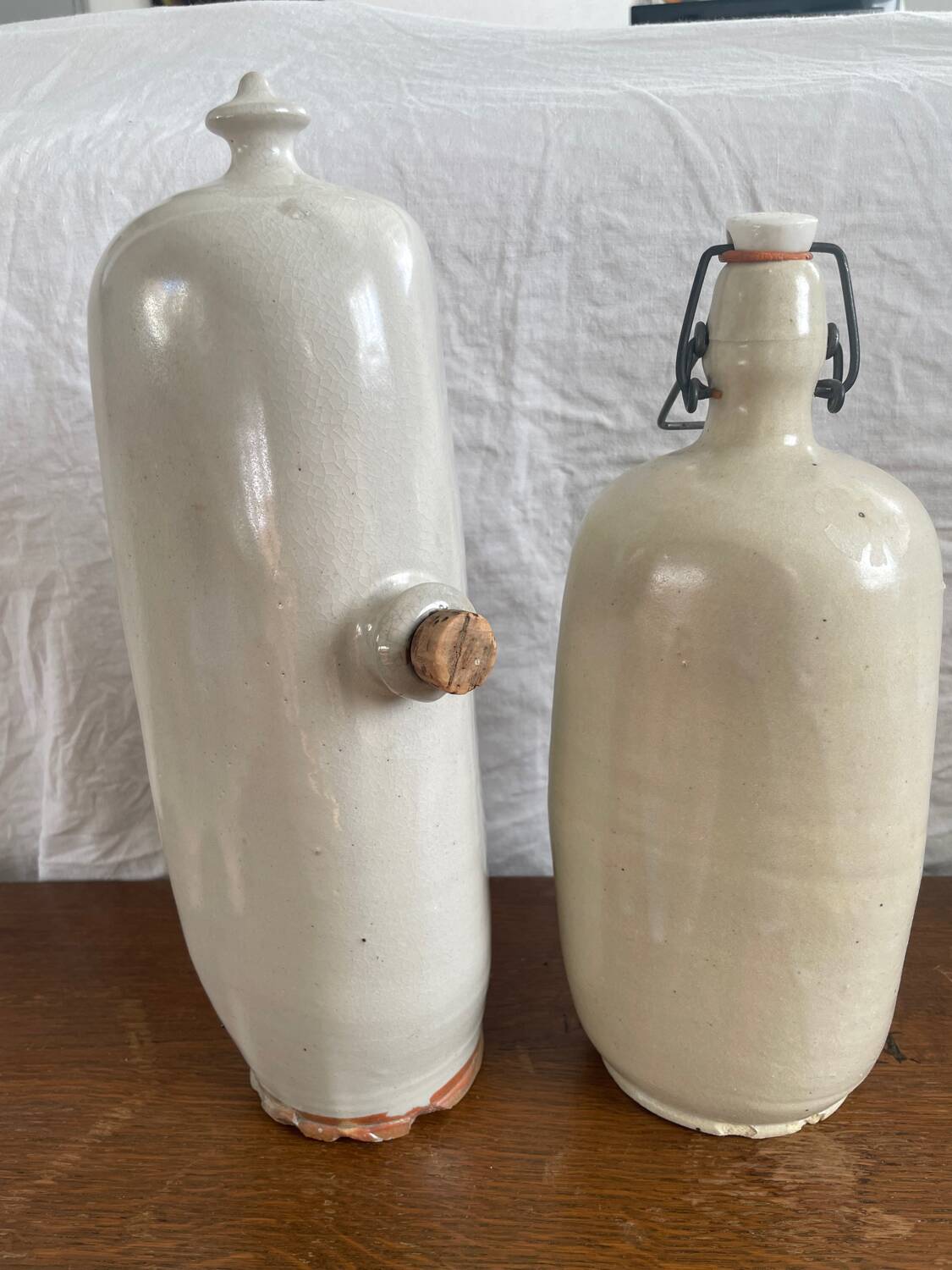 2 old stoneware hot water bottles