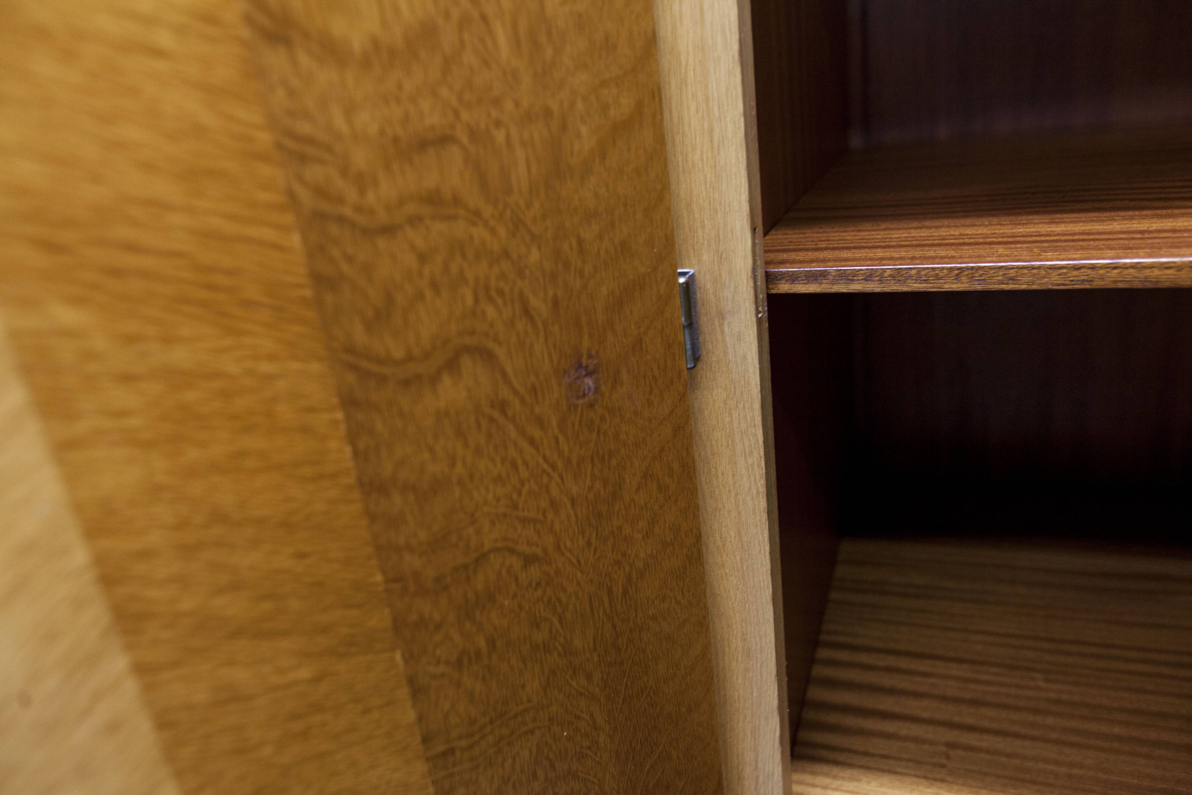 French wardrobe with tapered legs, 3 doors, 1 mirror (27*130), and 1 drawer.