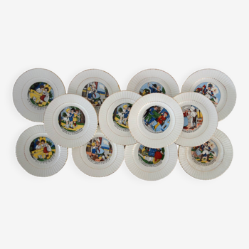 Dessert service of 12 speaking plates and Digoin dish from the 1930s