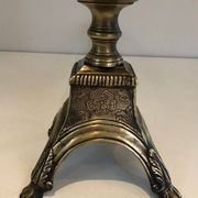 Pair of chiselled bronze and wrought iron fire dogs in the Louis XVI style.