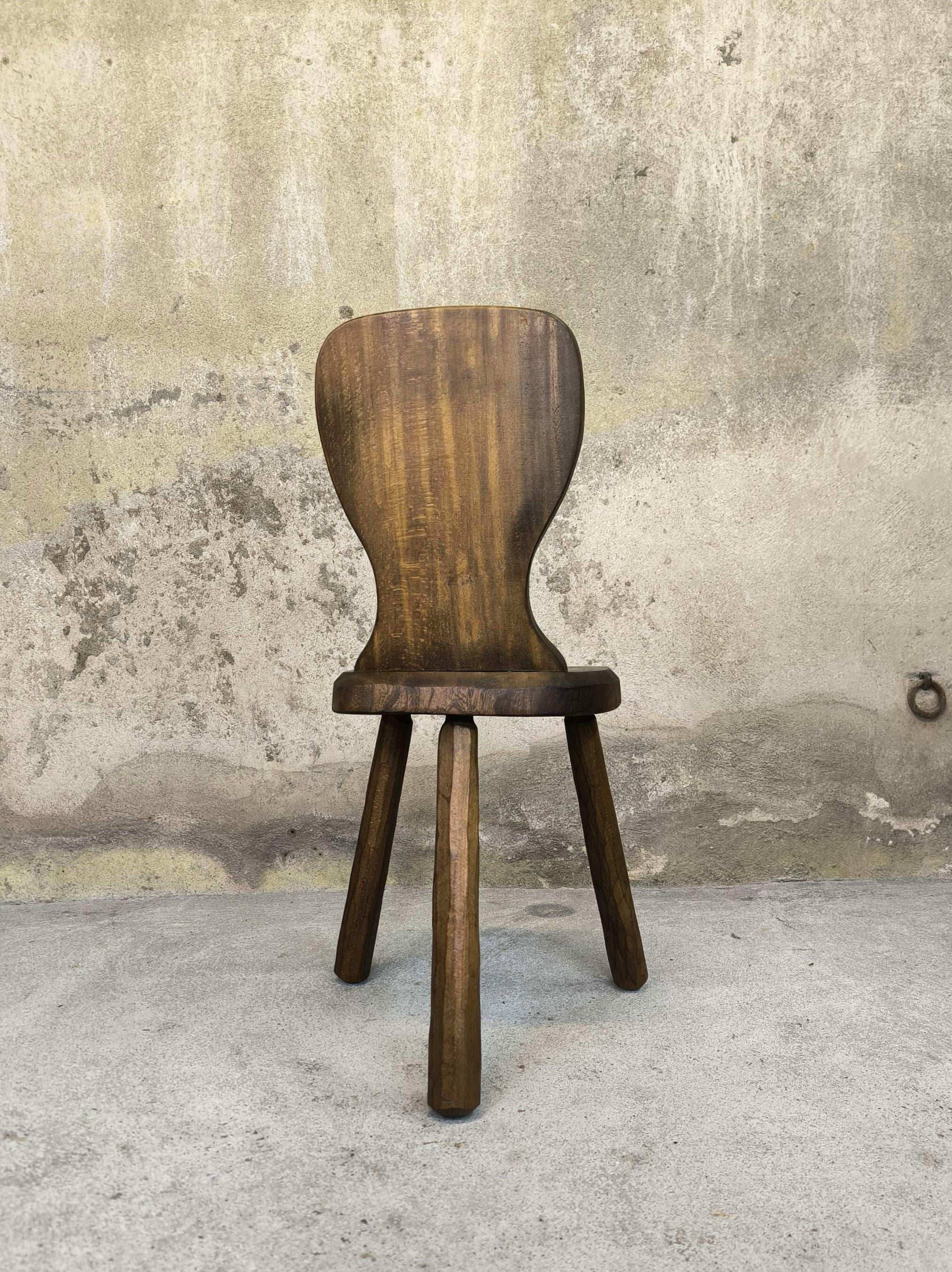 Vintage tripod chair made of solid wood.
