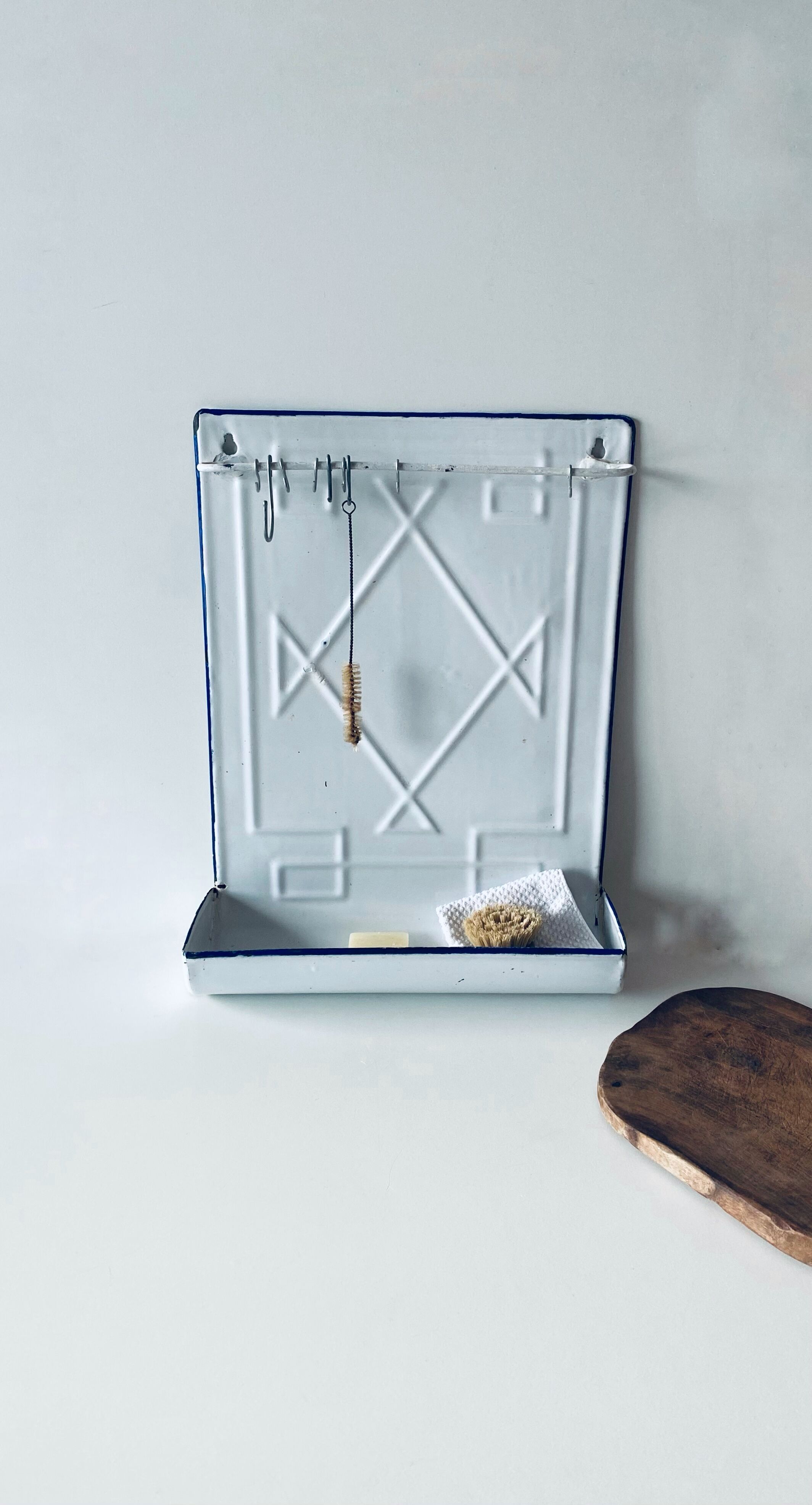 Old enamelled kitchen utensil display