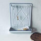 Old enamelled kitchen utensil display