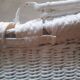 Wicker and painted wood baby cradle