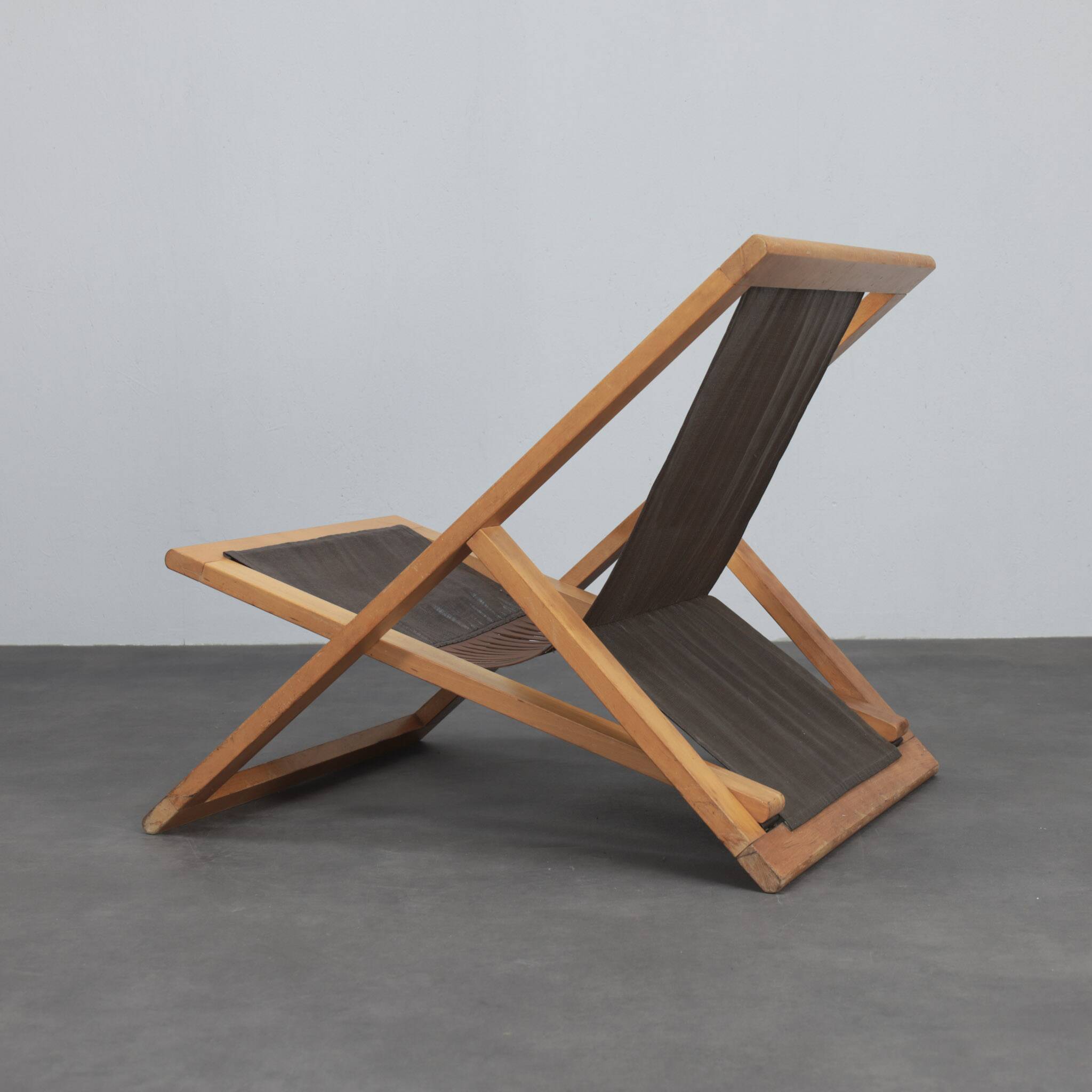 Modernist folding lounge chair with wooden frame, 1970s