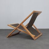 Modernist folding lounge chair with wooden frame, 1970s