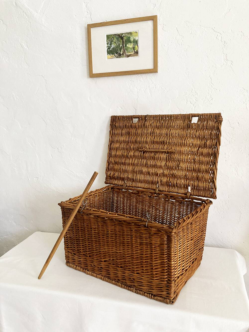 Old wicker basket with closure and handle