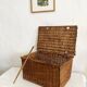 Old wicker basket with closure and handle