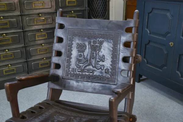 Armchair with ottoman by Angel Pazmino in wood and brown leather 1960's