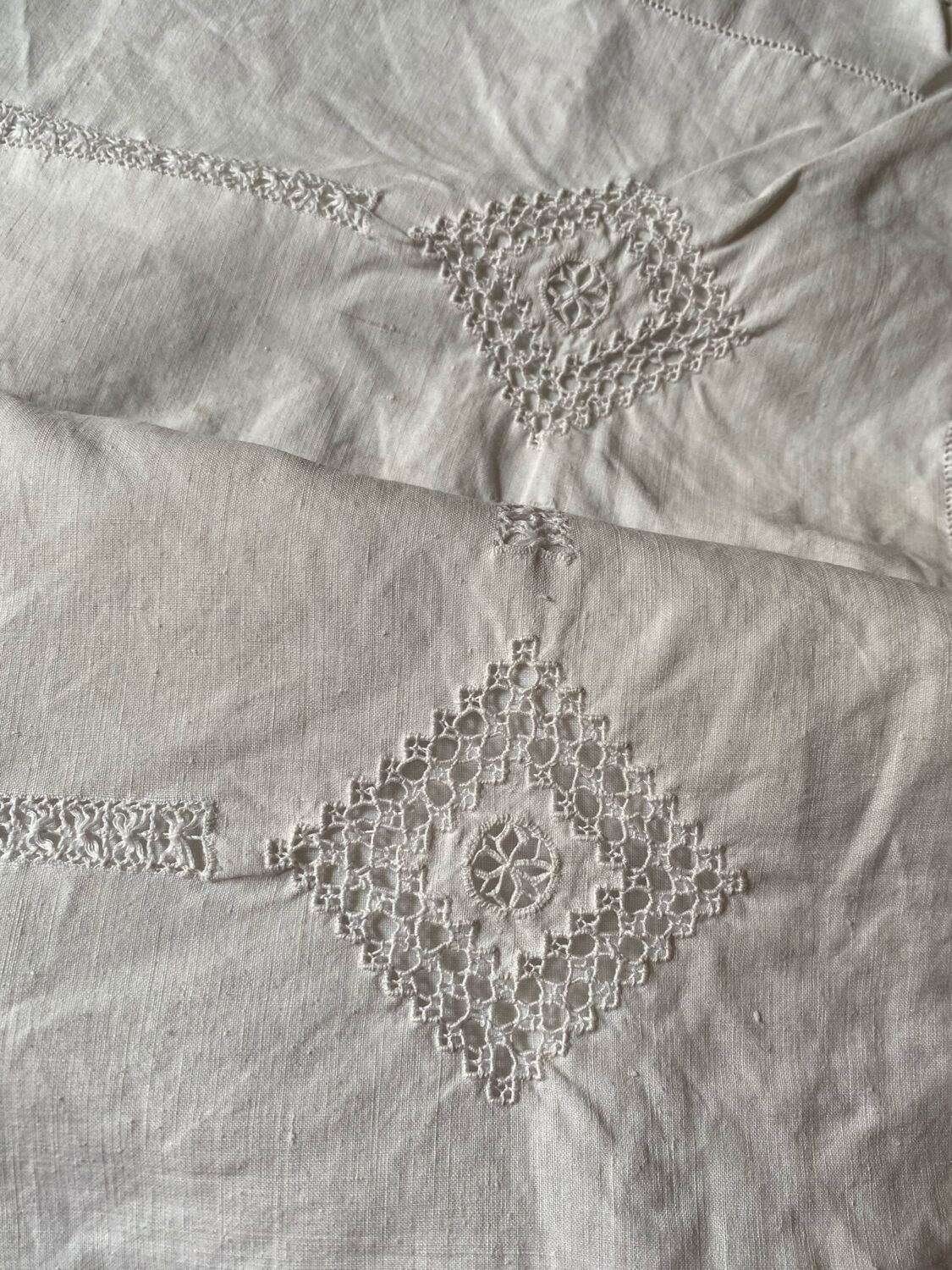 Pair of old cotton embroidered pillowcases with monograms.