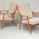 Pair of Boomerang-style armchairs in ecru beige fabric, 1960s.