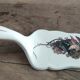 Earthenware pie shovel Obernai décor signed Henri Loux