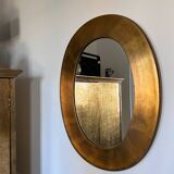 Gold oval mirror