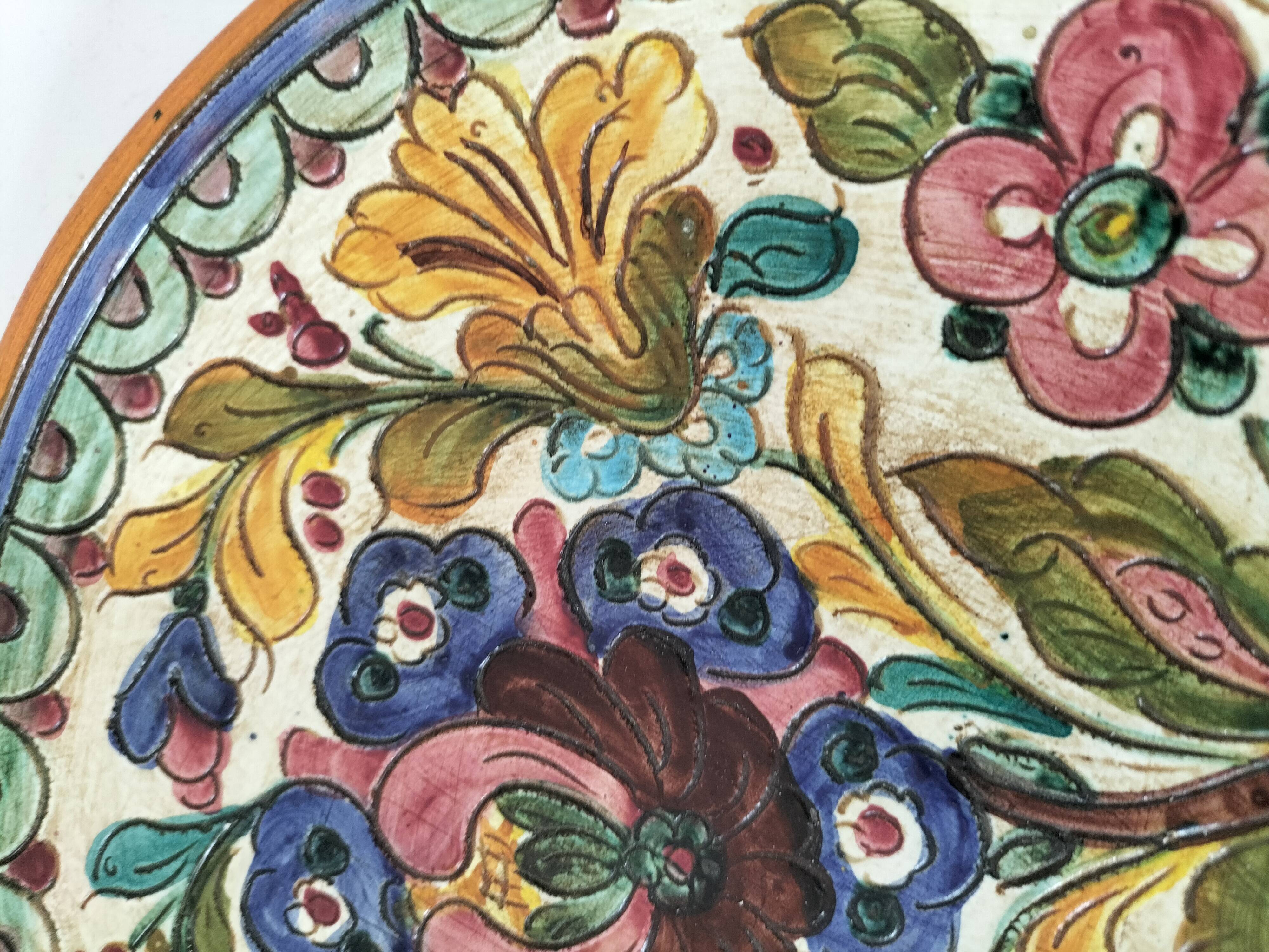 Spanish earthenware plate, hand-painted floral decoration.