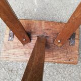 Old farm stool raw wood tripod