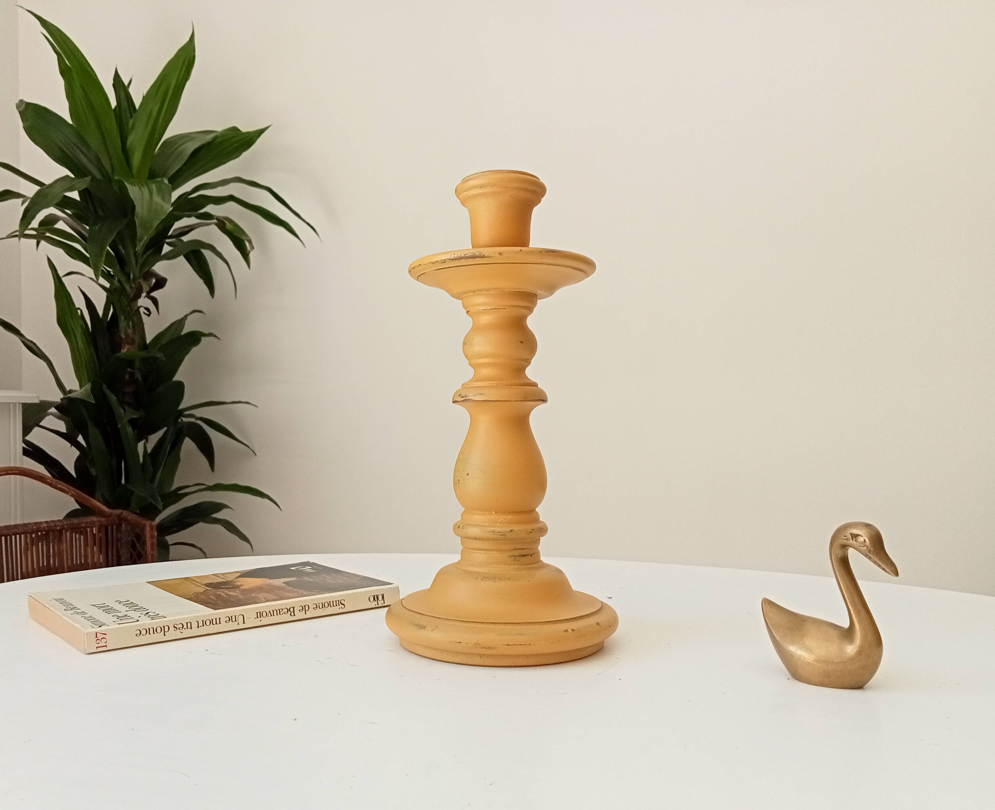 Vintage candle holder in weathered yellow wood