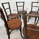 Set of 7 old Baumann bistro chairs in curved wood with round seat
