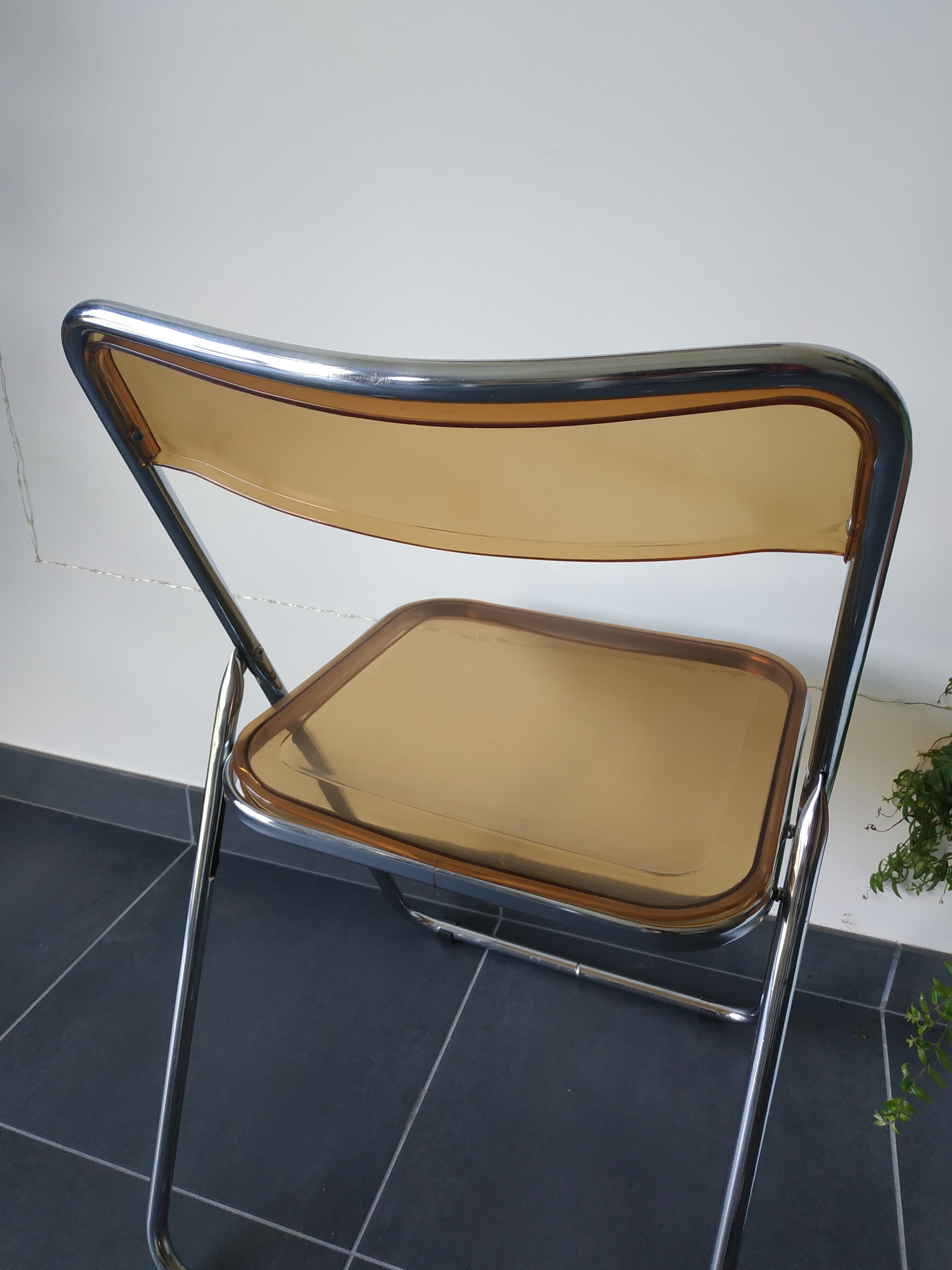 Seventies stainless steel and caramel chairs