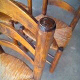 Set of 4 straw-covered brutalist chairs by George Robert