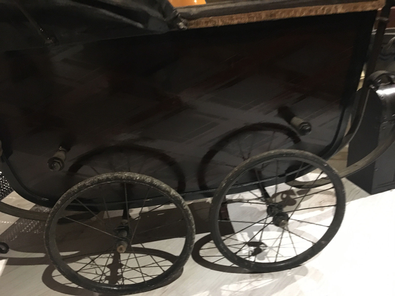 Landau of the years 1920-1930 in wood and leather