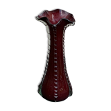 Burgundy red blown glass vase in the shape of a vintage corolla