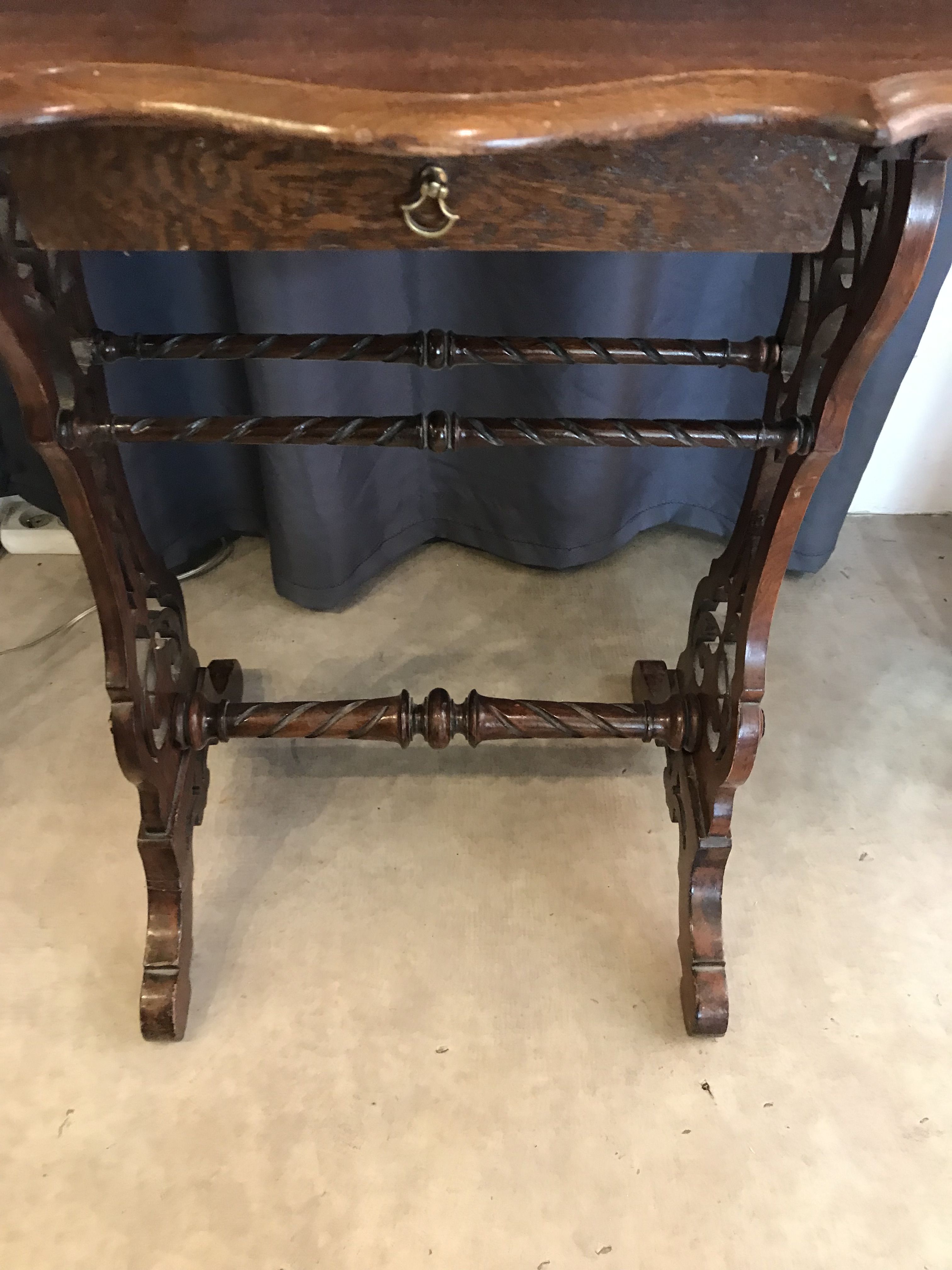Art nouveau mahogany table with cut-out top