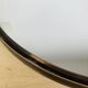 Miroir rond cerclage ambré années 70 vintage